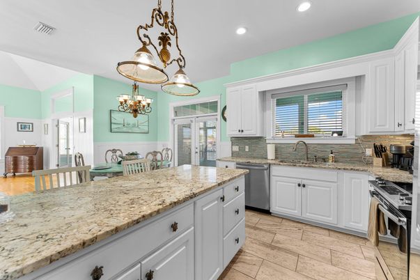Chandelier, Dining room, Interior, Kitchen, Recessed Lighting, Stainless Steel Appliances, Wood Texture Flooring