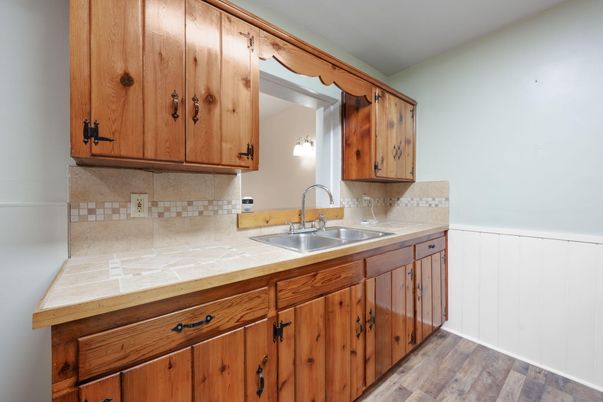 Interior, Kitchen, Tile Countertops, Wood Texture Flooring