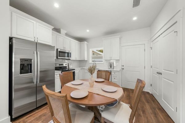 Dining room, Interior, Kitchen, Recessed Lighting, Stainless Steel Appliances, Wood Texture Flooring