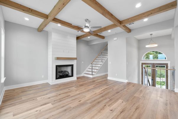 Empty room, Fireplace, Interior, Pendant Lights, Recessed Lighting, Wooden Beams, Wood Texture Flooring