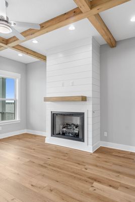 Empty room, Fireplace, Interior, Recessed Lighting, Wooden Beams, Wood Texture Flooring