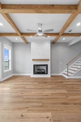 Empty room, Fireplace, Interior, Recessed Lighting, Wooden Beams, Wood Texture Flooring