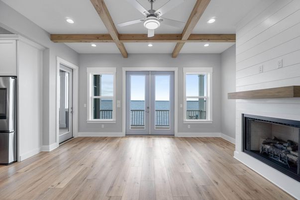 Empty room, Fireplace, Interior, Recessed Lighting, Water, Wooden Beams, Wood Texture Flooring