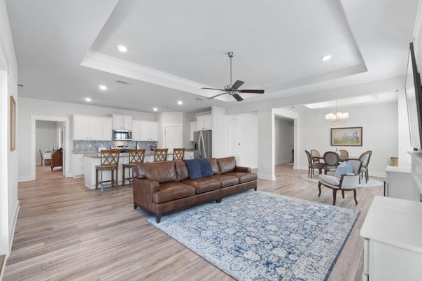 Chandelier, Dining room, Interior, Kitchen, Living room, Recessed Lighting, Stainless Steel Appliances, Wood Texture Flooring