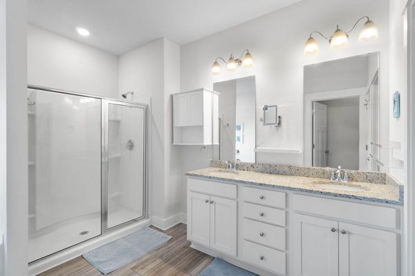 Bathroom, Dual Sink Vanities, Glass Shower, Interior, Recessed Lighting, Wood Texture Flooring