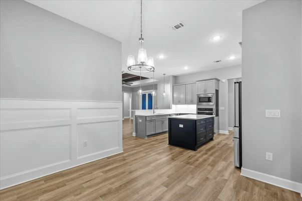 Interior, Kitchen, Pendant Lights, Recessed Lighting, Stainless Steel Appliances, Wood Texture Flooring