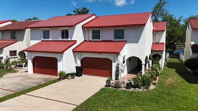 Attached, Exterior, Facade, Spanish Mediterranean
