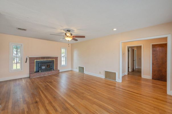 Empty room, Fireplace, Interior, Recessed Lighting, Wood Texture Flooring