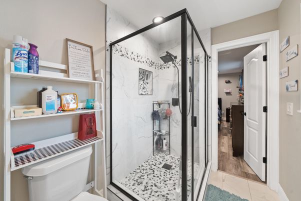 Bathroom, Glass Shower, Interior, Marble Walls, Recessed Lighting, Wood Texture Flooring