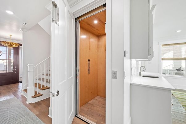 Chandelier, Elevator, Interior, Recessed Lighting, Wooden Ceilings, Wood Texture Flooring, Wooden Walls