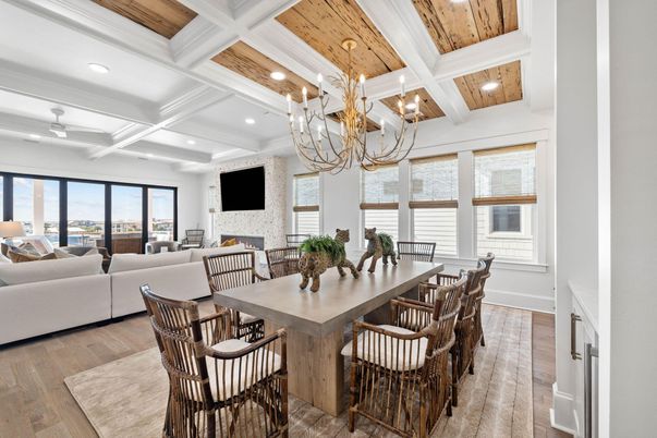 Chandelier, Dining room, Fireplace, Interior, Living room, Recessed Lighting, Wooden Beams, Wooden Ceilings, Wood Texture Flooring