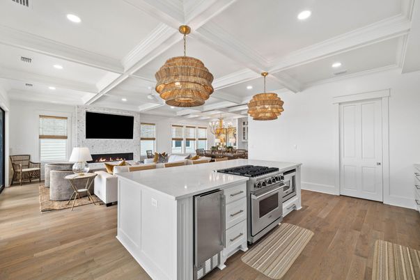 Chandelier, Fireplace, Interior, Kitchen, Living room, Pendant Lights, Recessed Lighting, Wood Texture Flooring