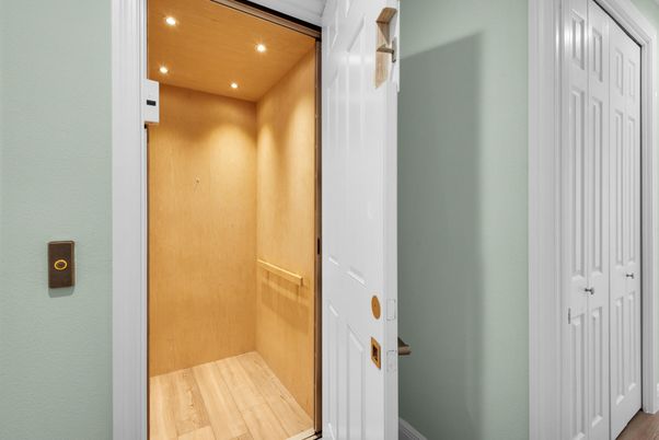 Elevator, Interior, Recessed Lighting, Wooden Ceilings, Wood Texture Flooring, Wooden Walls