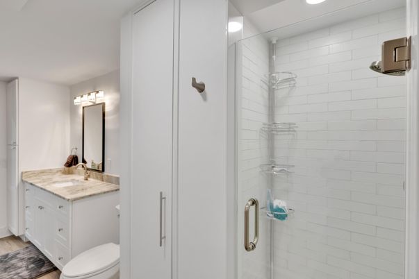 Bathroom, Glass Shower, Interior, Recessed Lighting, Wood Texture Flooring