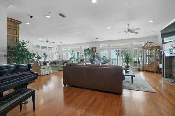 Fireplace, Interior, Living room, Piano, Recessed Lighting, Wood Texture Flooring