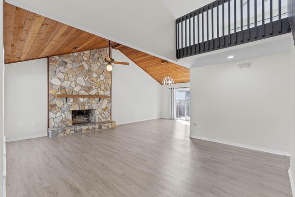 Fireplace, Interior, Pendant Lights, Recessed Lighting, Stone Walls, Wooden Ceilings, Wood Texture Flooring