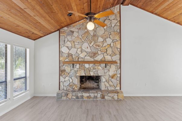 Empty room, Fireplace, Interior, Stone Walls, Wooden Ceilings, Wood Texture Flooring