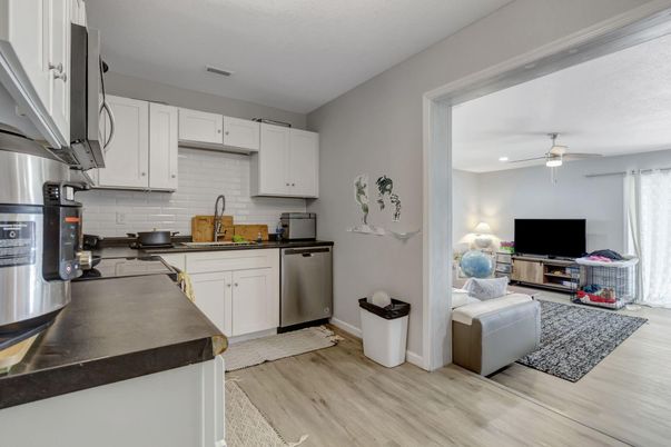 Interior, Kitchen, Recessed Lighting, Stainless Steel Appliances, Wood Texture Flooring