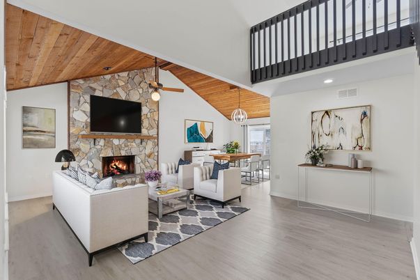 Dining room, Fireplace, Interior, Living room, Pendant Lights, Recessed Lighting, Stone Walls, Wooden Ceilings, Wood Texture Flooring