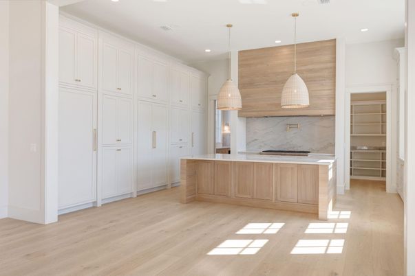 Interior, Kitchen, Marble Walls, Pendant Lights, Recessed Lighting, Stainless Steel Appliances, Wood Texture Flooring