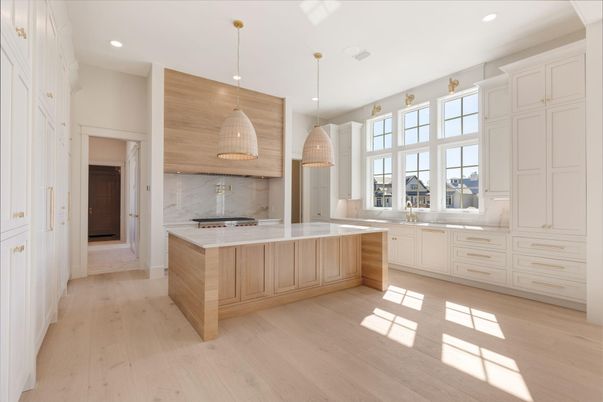 Interior, Kitchen, Marble Walls, Pendant Lights, Recessed Lighting, Stainless Steel Appliances, Wood Texture Flooring