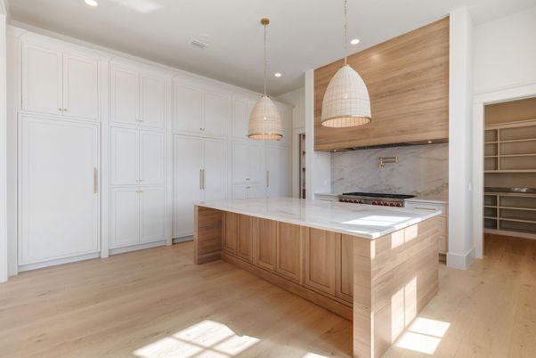 Interior, Kitchen, Marble Walls, Pendant Lights, Recessed Lighting, Stainless Steel Appliances, Wood Texture Flooring