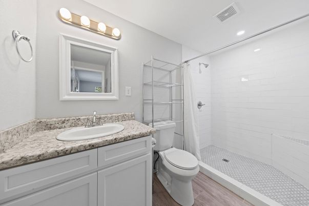 Bathroom, Dual Sink Vanities, Interior, Recessed Lighting, Wood Texture Flooring