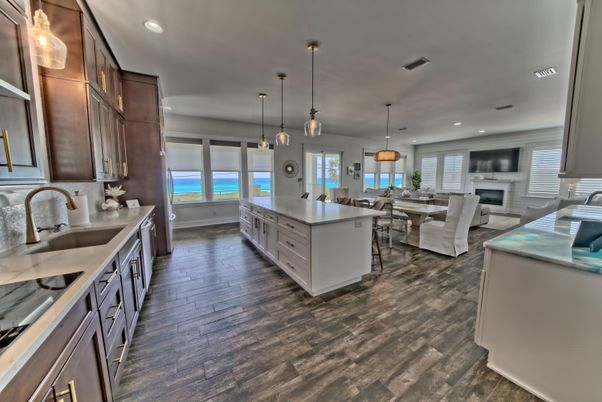 Dining room, Fireplace, Interior, Kitchen, Living room, Pendant Lights, Recessed Lighting, Water, Wood Texture Flooring
