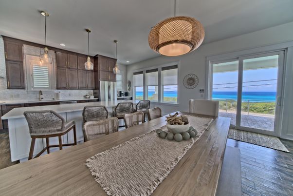 Dining room, Interior, Kitchen, Pendant Lights, Recessed Lighting, Stainless Steel Appliances, Water, Wood Texture Flooring