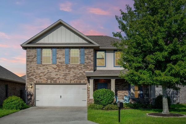 Attached, Exterior, Facade, Brick Facade, Brick Traditional