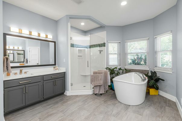 Bathroom, Dual Sink Vanities, Free Standing Baths, Glass Shower, Interior, Recessed Lighting, Wood Texture Flooring
