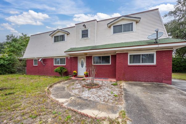 Exterior, Facade, Brick Facade, Cape Cod