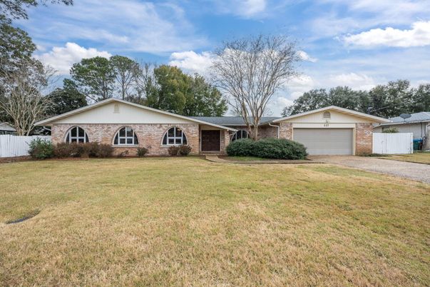 Attached, Backyard, Exterior, Facade, Brick Facade, Ranch