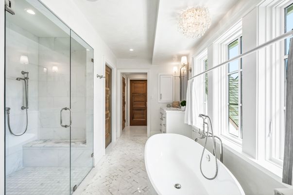 Bathroom, Chandelier, Free Standing Baths, Glass Shower, Interior, Marble, Marble Walls, Recessed Lighting