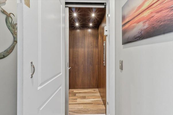 Elevator, Interior, Recessed Lighting, Wooden Ceilings, Wood Texture Flooring, Wooden Walls