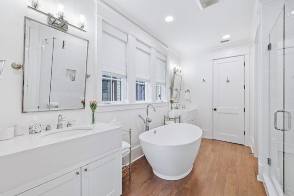 Bathroom, Dual Sink Vanities, Free Standing Baths, Glass Shower, Interior, Recessed Lighting, Wood Texture Flooring