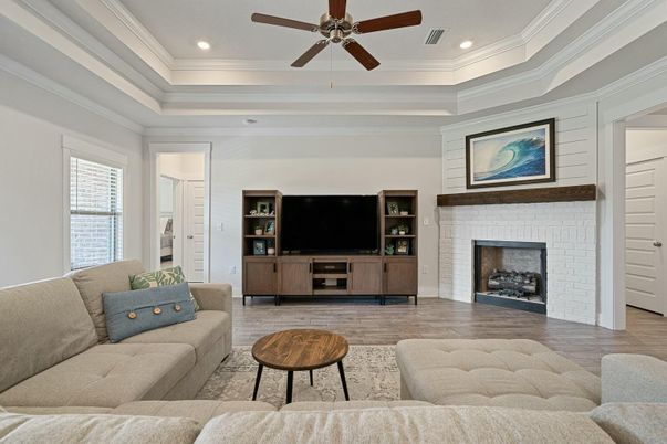 Fireplace, Interior, Living room, Recessed Lighting, Stone Walls, Wood Texture Flooring