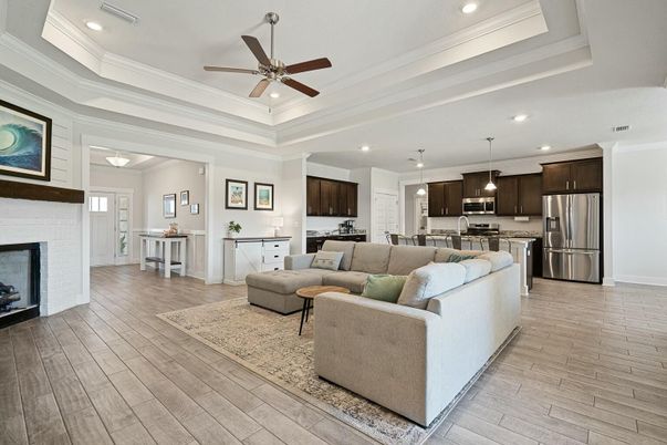 Dining room, Fireplace, Interior, Kitchen, Living room, Pendant Lights, Recessed Lighting, Stainless Steel Appliances, Wood Texture Flooring