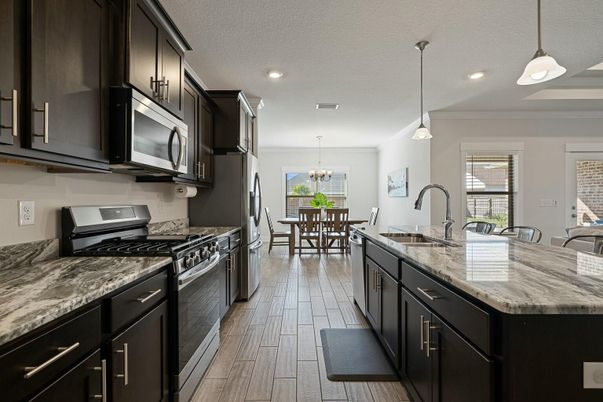 Chandelier, Dining room, Interior, Kitchen, Pendant Lights, Recessed Lighting, Stainless Steel Appliances, Wood Texture Flooring