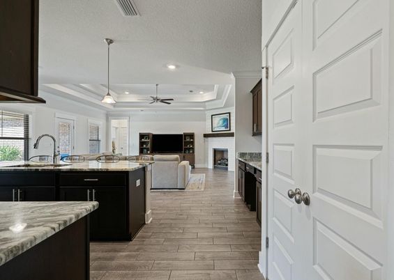 Fireplace, Interior, Kitchen, Living room, Pendant Lights, Recessed Lighting, Wood Texture Flooring