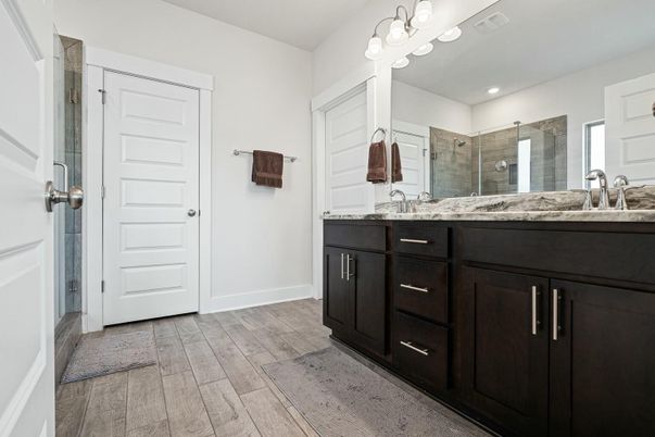 Bathroom, Dual Sink Vanities, Interior, Recessed Lighting, Wood Texture Flooring
