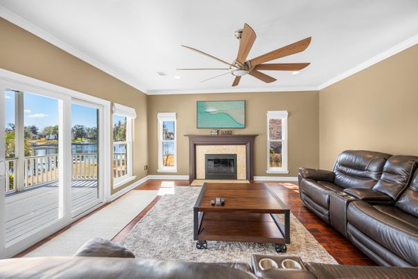 Fireplace, Interior, Living room, Recessed Lighting, Water, Wood Texture Flooring