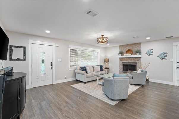 Fireplace, Interior, Living room, Recessed Lighting, Wood Texture Flooring