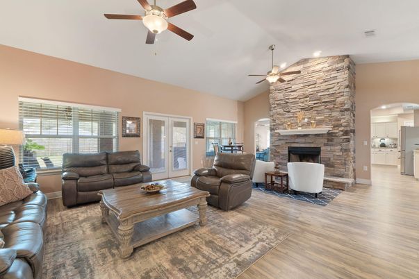 Fireplace, Interior, Kitchen, Living room, Recessed Lighting, Stone Walls, Wood Texture Flooring