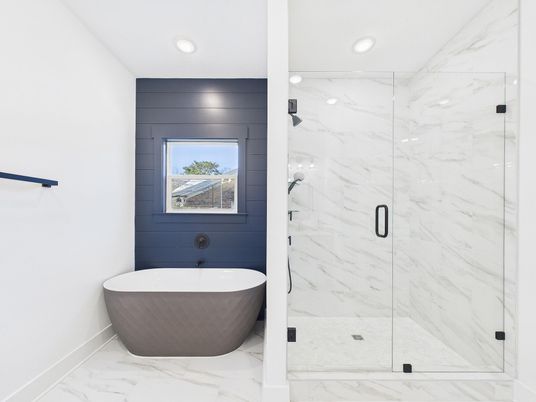 Bathroom, Free Standing Baths, Glass Shower, Interior, Marble, Marble Walls, Recessed Lighting