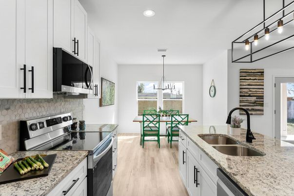 Dining room, Interior, Kitchen, Pendant Lights, Recessed Lighting, Stainless Steel Appliances, Wood Texture Flooring