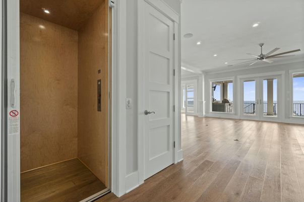 Elevator, Interior, Recessed Lighting, Wood Texture Flooring, Wooden Walls