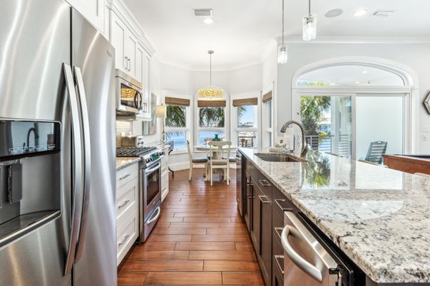 Dining room, Interior, Kitchen, Pendant Lights, Recessed Lighting, Stainless Steel Appliances, Wood Texture Flooring