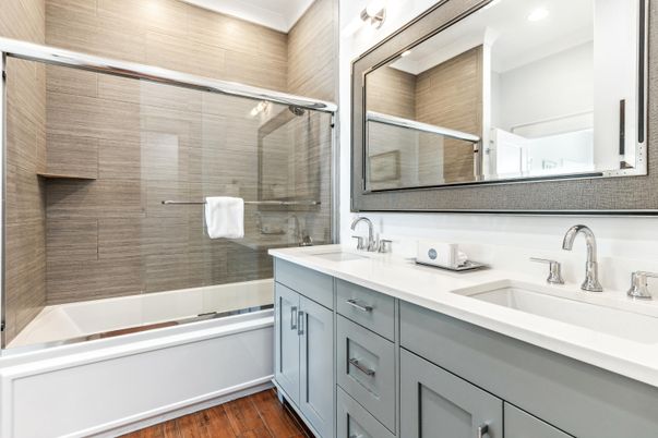 Bathroom, Dual Sink Vanities, Glass Shower, Interior, Recessed Lighting, Wood Texture Flooring