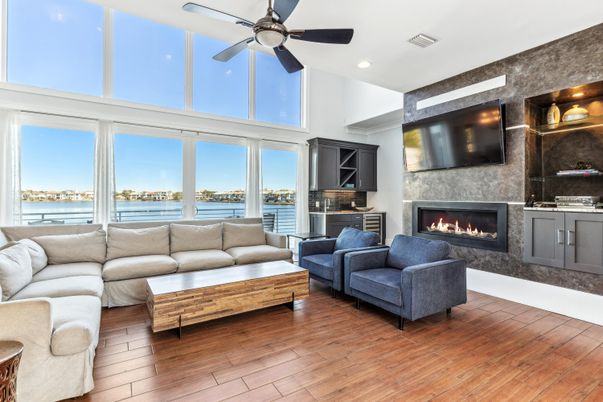 Fireplace, Interior, Living room, Recessed Lighting, Water, Wood Texture Flooring